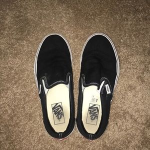 Black and white slip on women’s vans